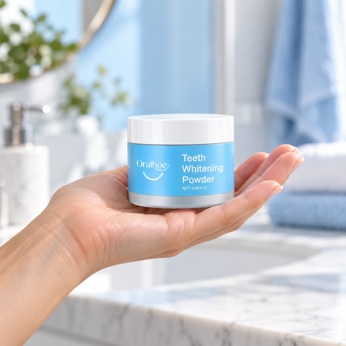 Oralhoe whitening powder jar held in the palm of a hand