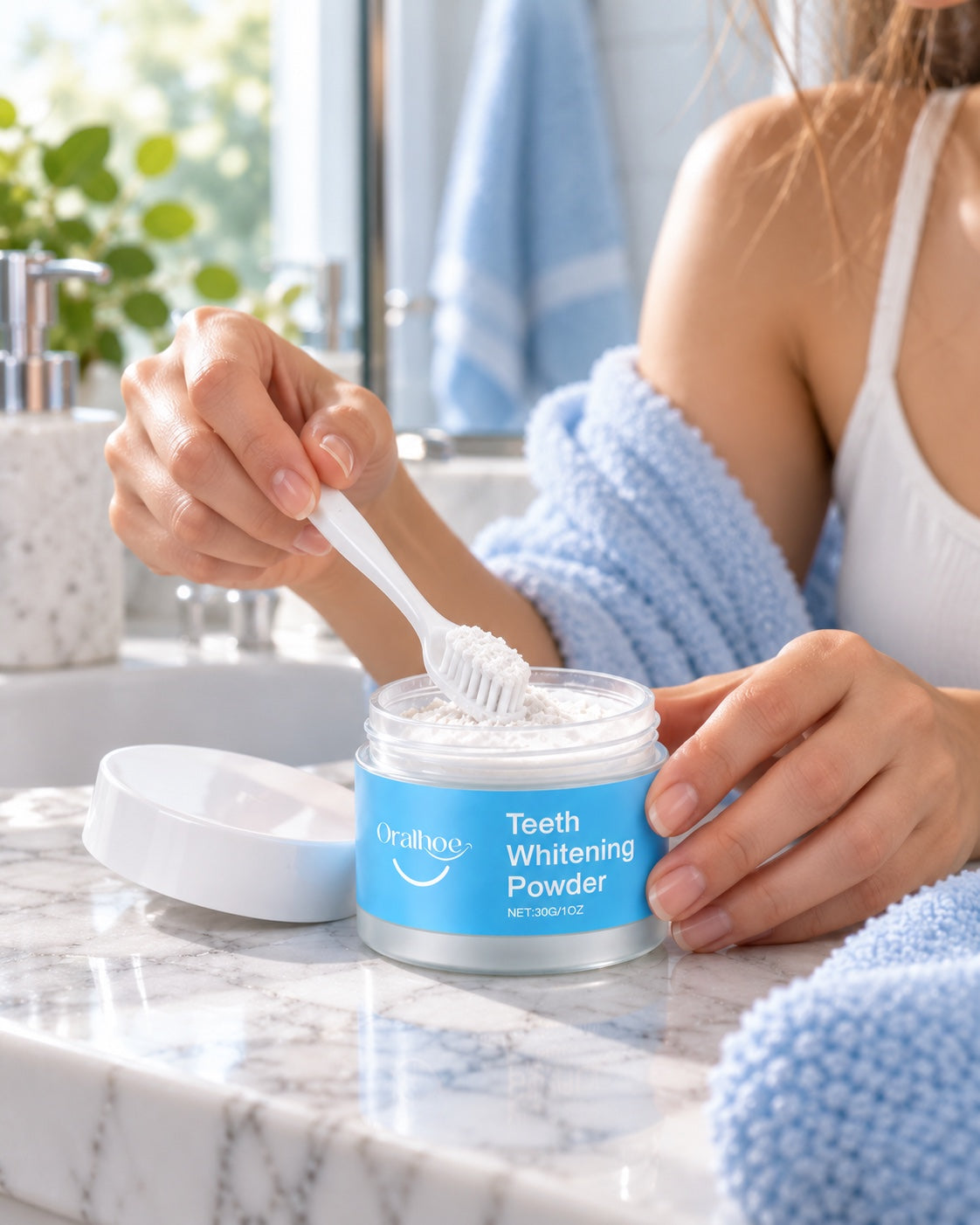 Dipping a toothbrush into the Oralhoe powder jar